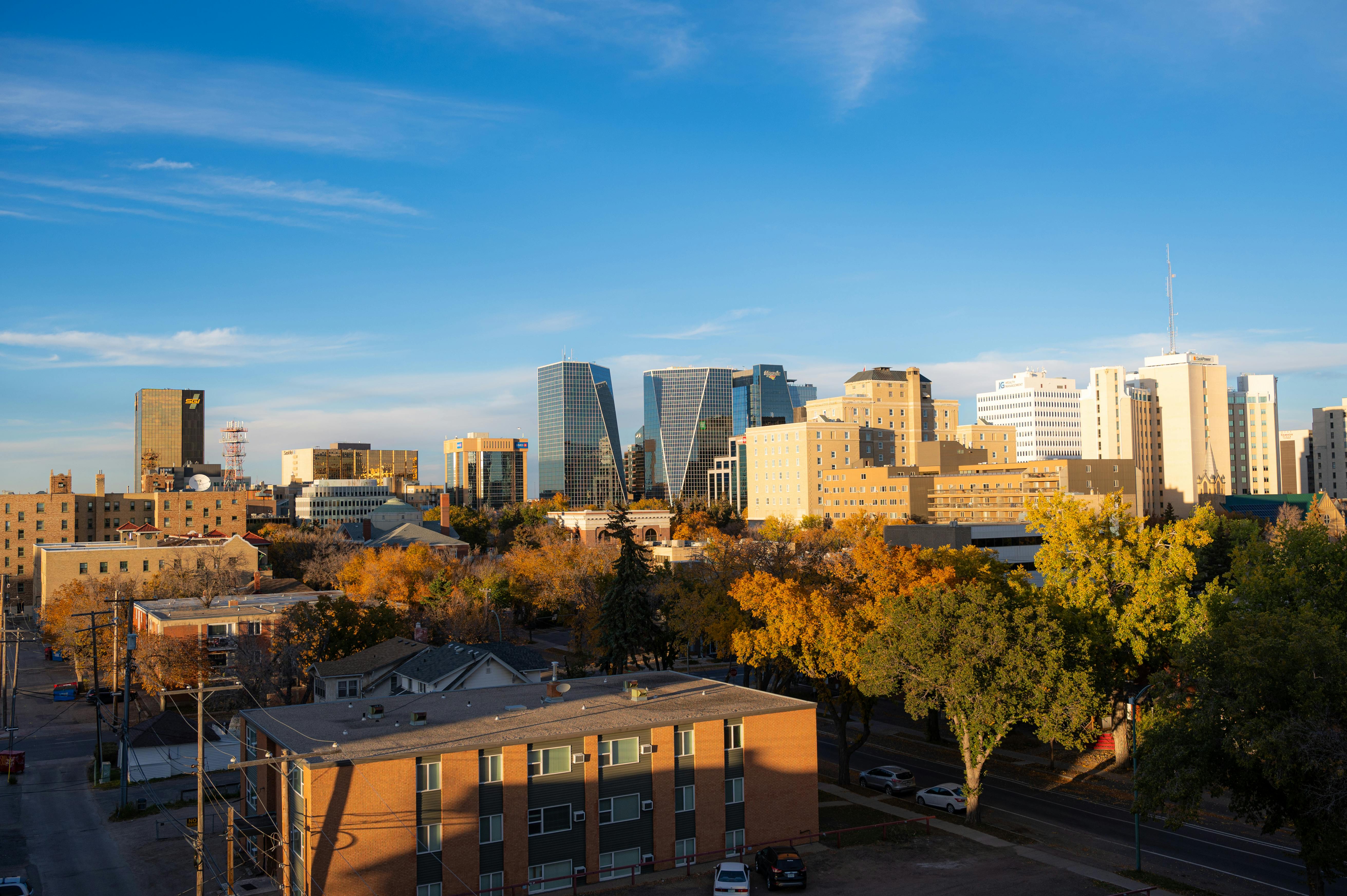 A drone view of Downtown Regina, featuring the Hill Towers, from a southwest vantage point.
