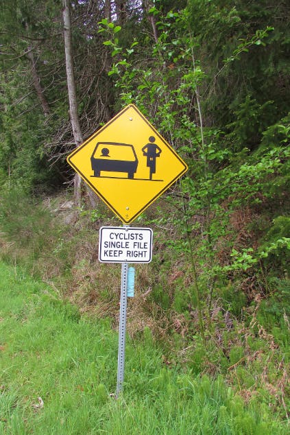 Cyclists signage on Missing Link hill, Saturna Island