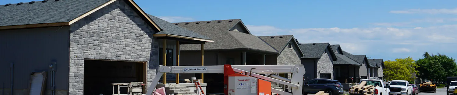 Photo of several houses under construction