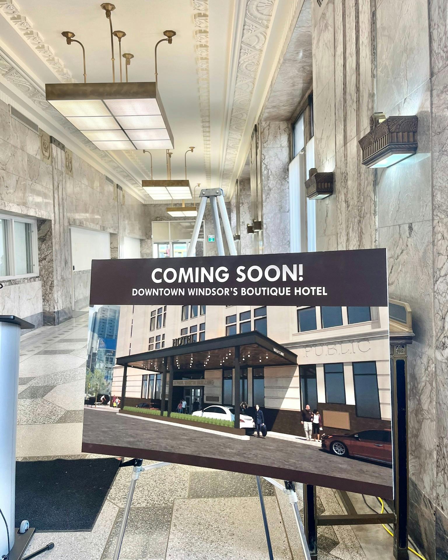 Photo of rendering of Downtown Windsor's Boutique Hotel in the lobby of the Paul Martin Building. 