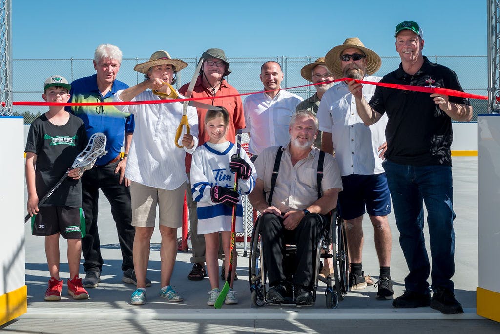 The sport box at Ravens Ridge Park is declared open with a ribbon cutting by local dignitaries and youth athletes on June 26, 2022