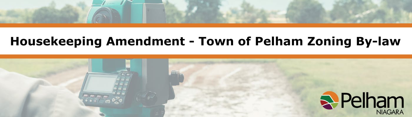 Housekeeping Amendment - Town of Pelham Zoning Bylaw with a surveyor overlooking a farm field