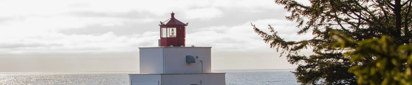 Lighthouse with the Pacific Ocean in the background