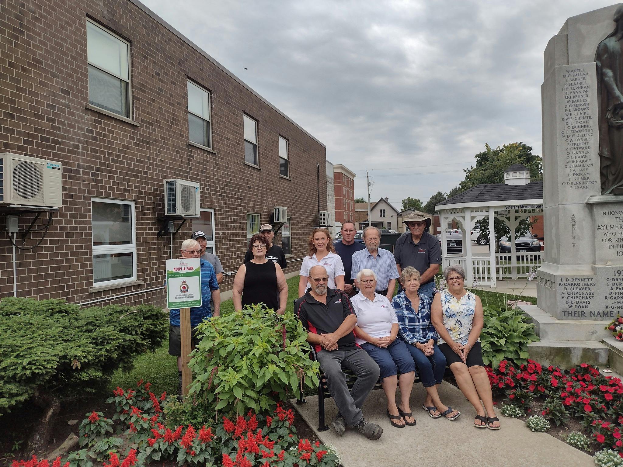 Members from the Legion and Aylmer Council before the Aylmer Cenotaph