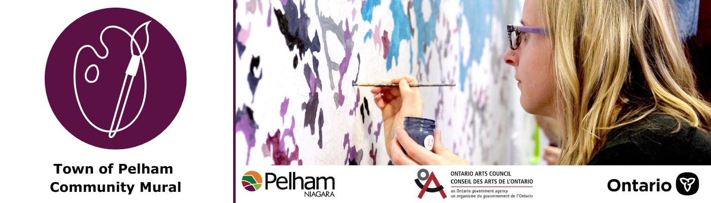 woman paints a paint by number large scale mural