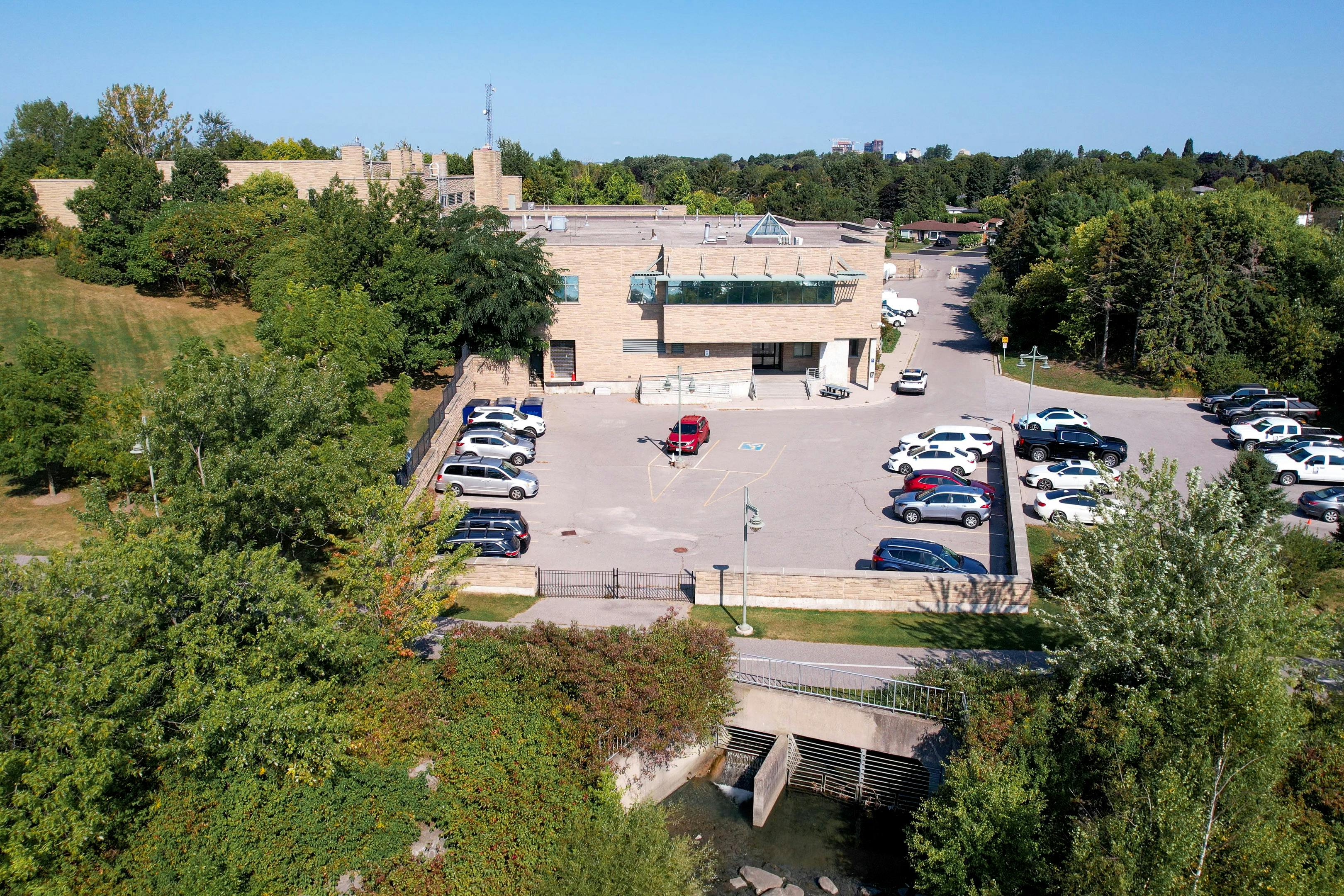 An aerial view outside and above the parking lot of the Ajax Water Supply Plant.