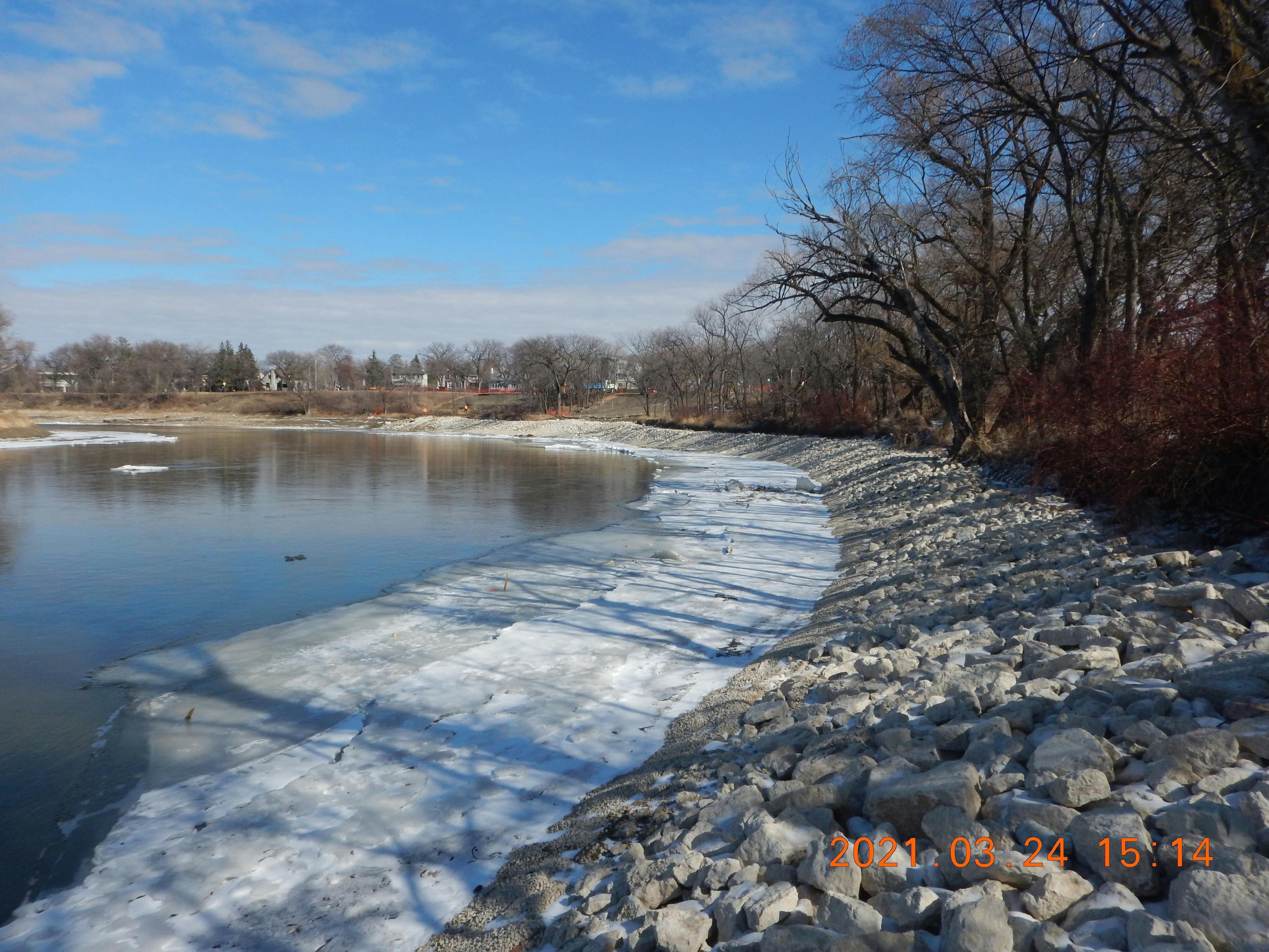 Riprap placed along the riverbank for erosion protection - March 2021