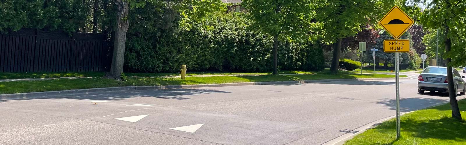 Speed bump on road