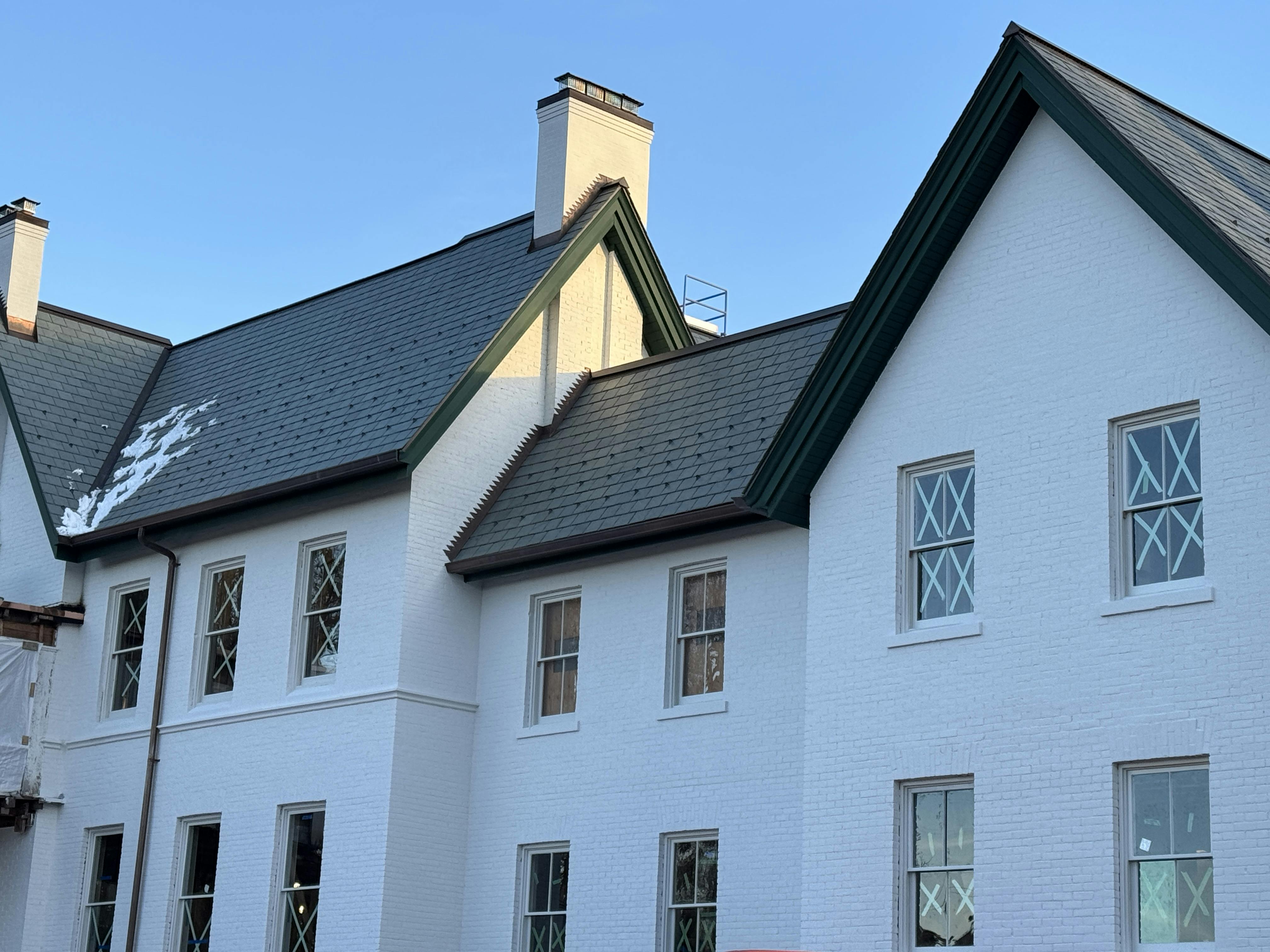 Mulock House is identifiable by its historic green roof