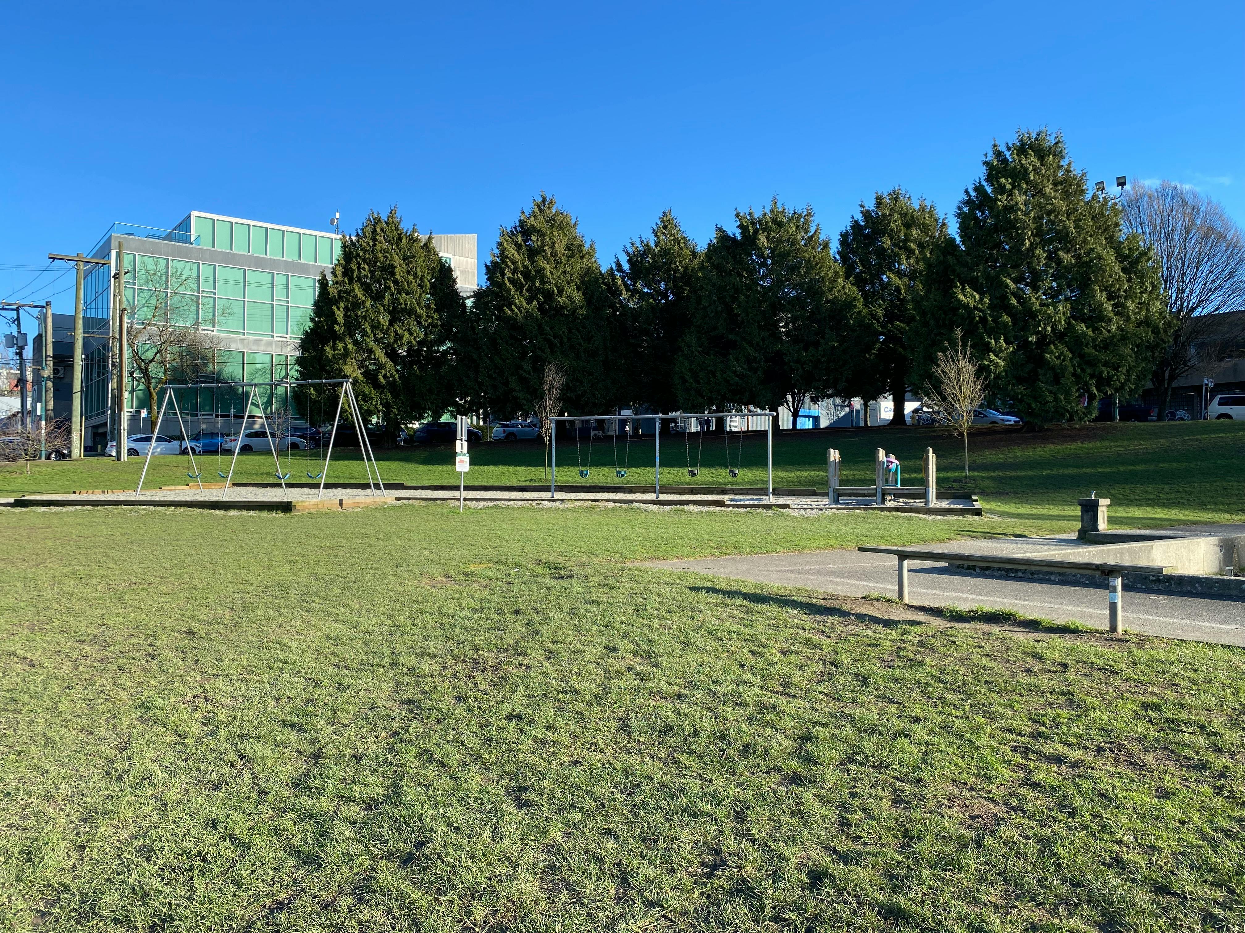 Outdated playground with many swings