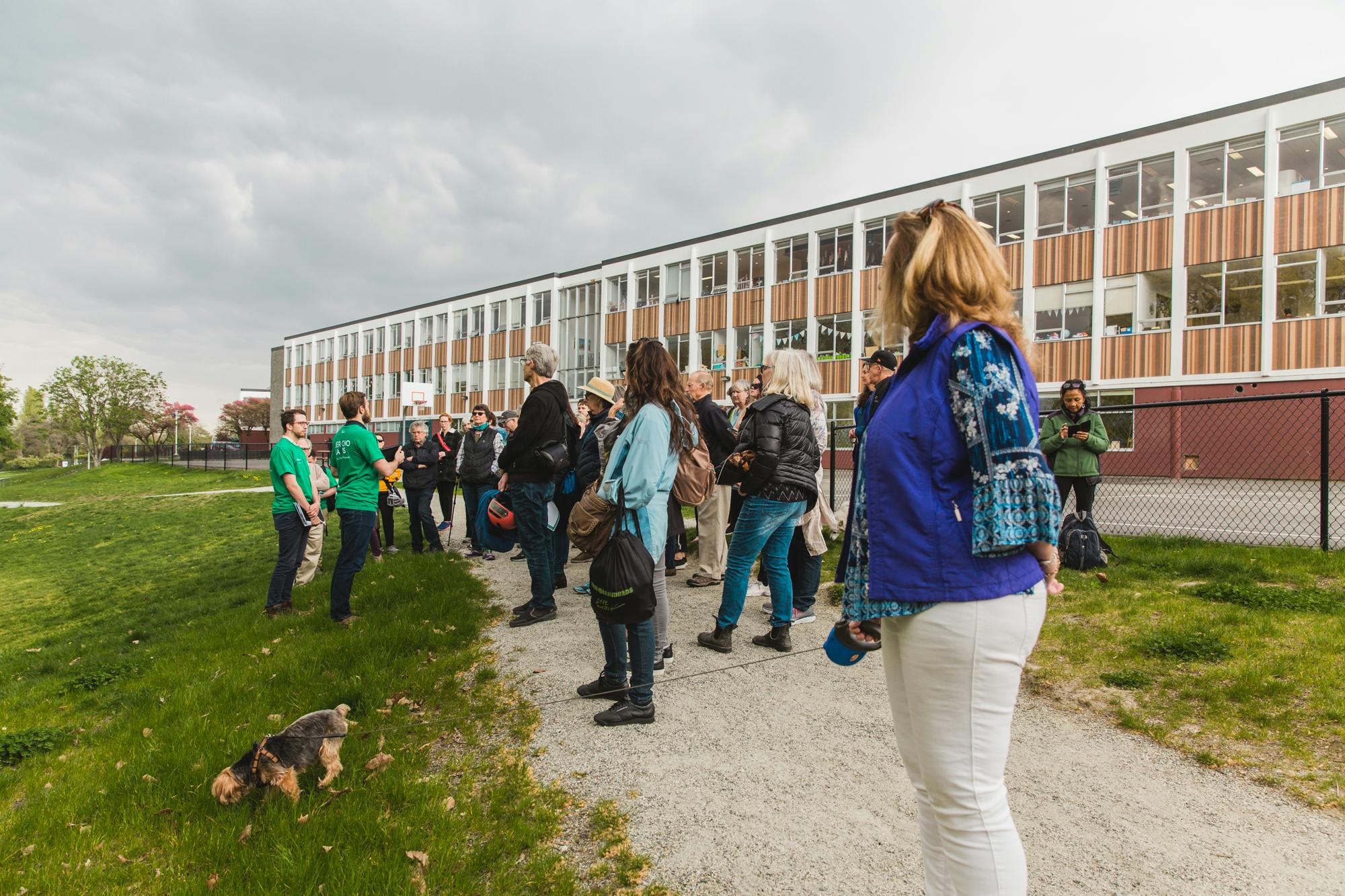 Group of people listening to Jane's Walk guides.