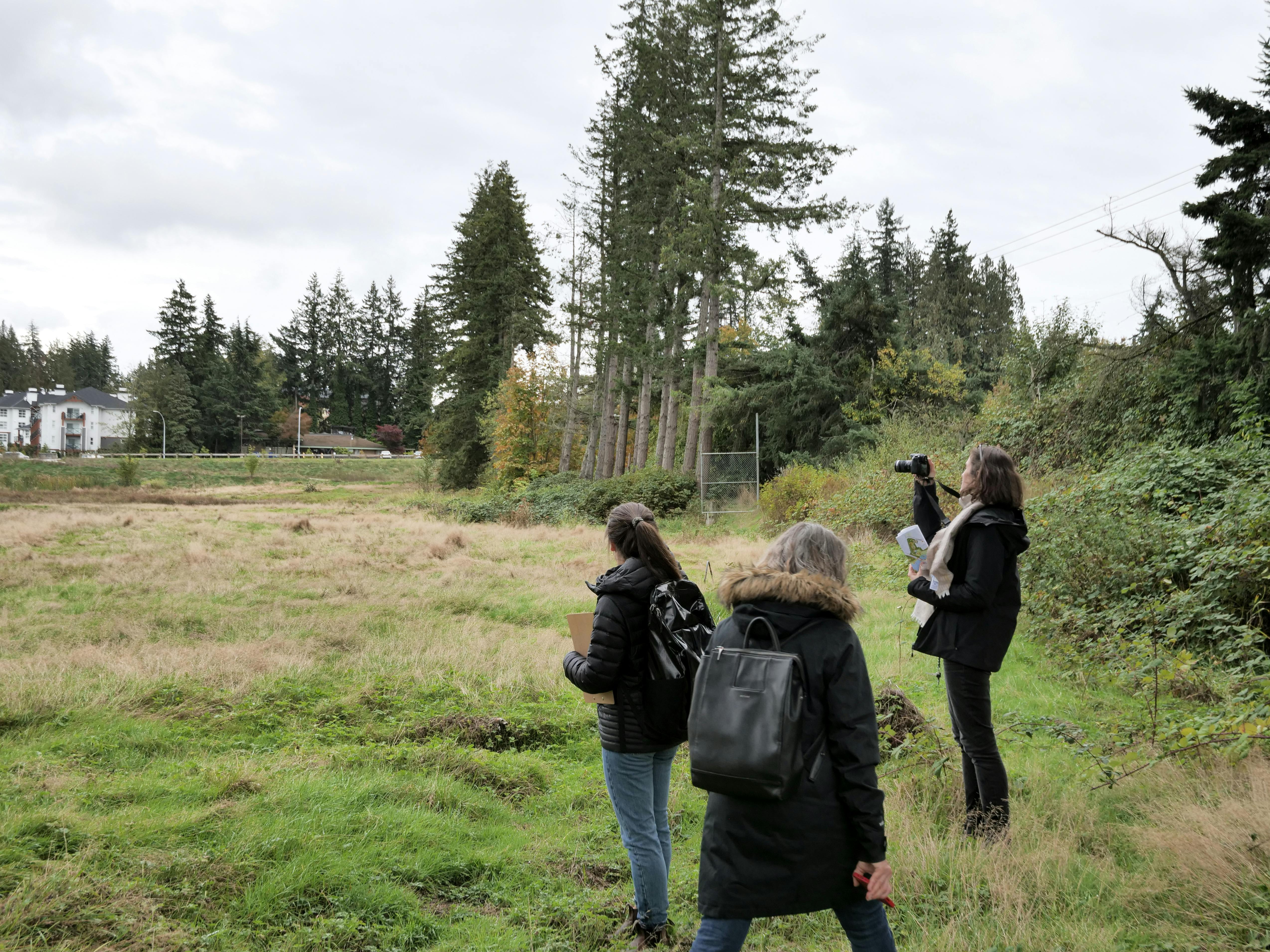 Designers photographing the Oxbow site