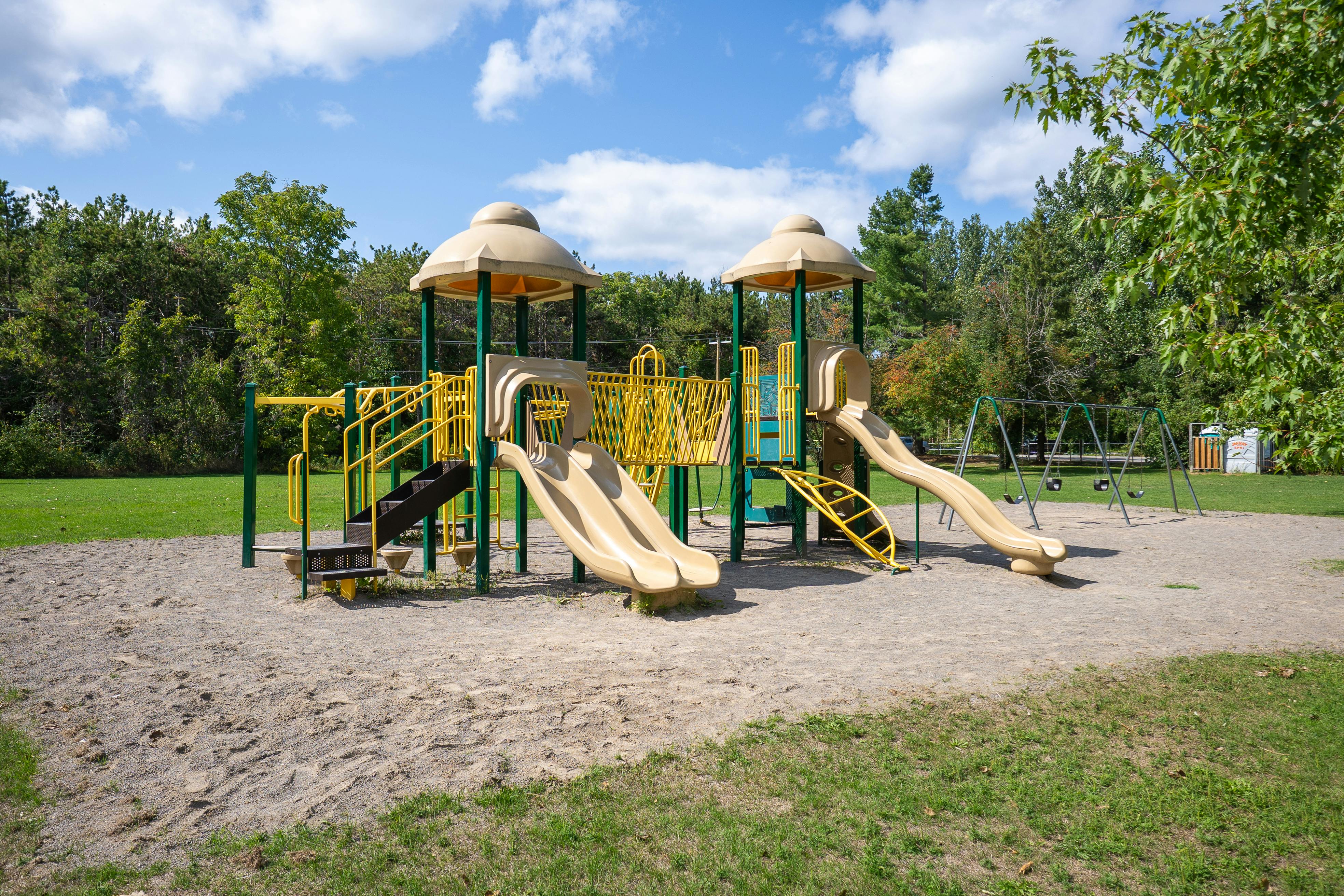 Photo of existing playground and swing set at the Ennismore Waterfront Park and Beach