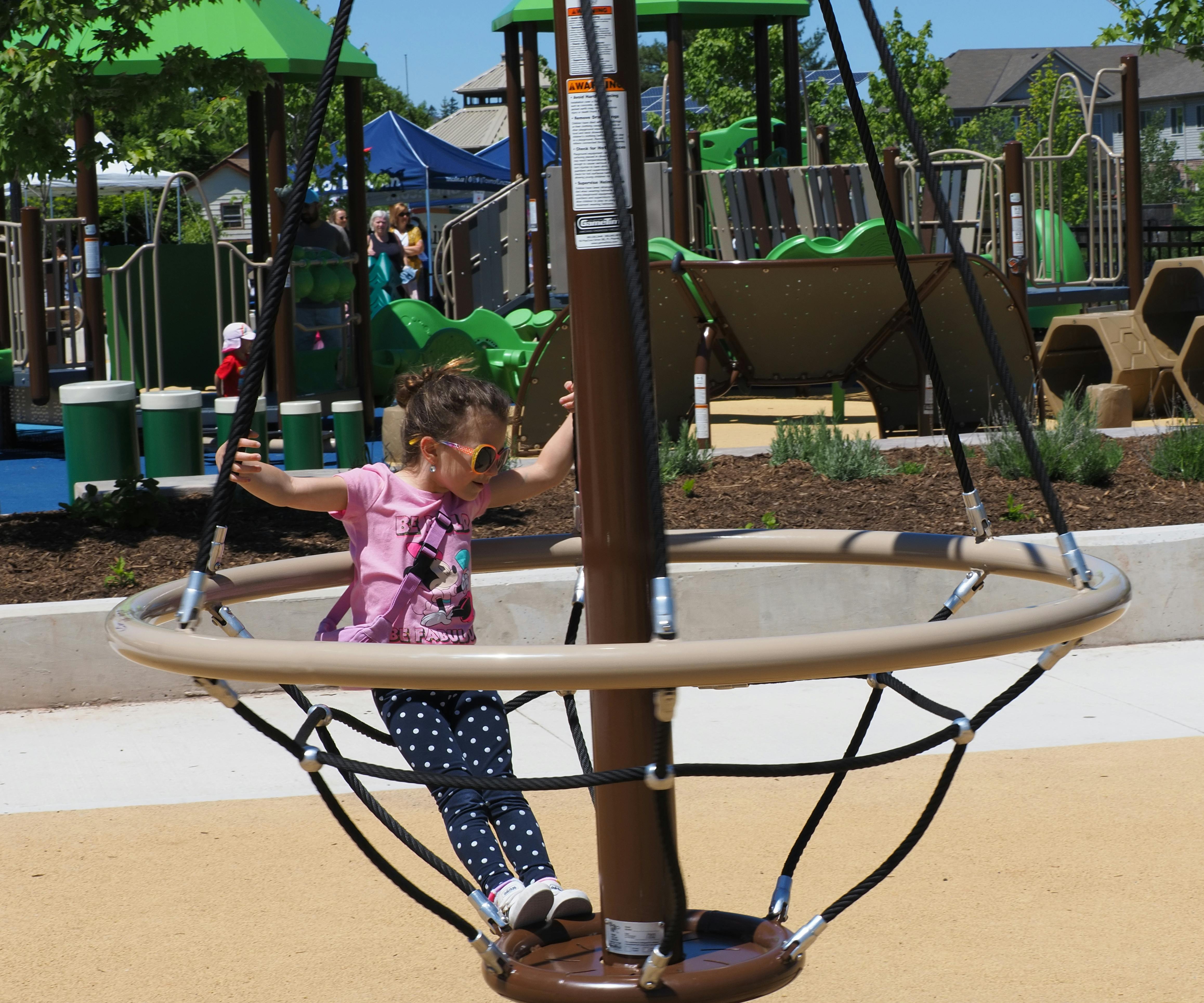 Lincoln residents enjoying the playground equipment