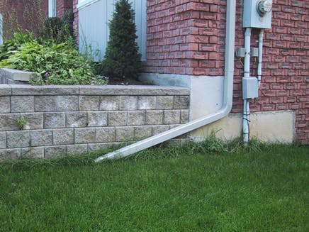Example of proper downspout drain