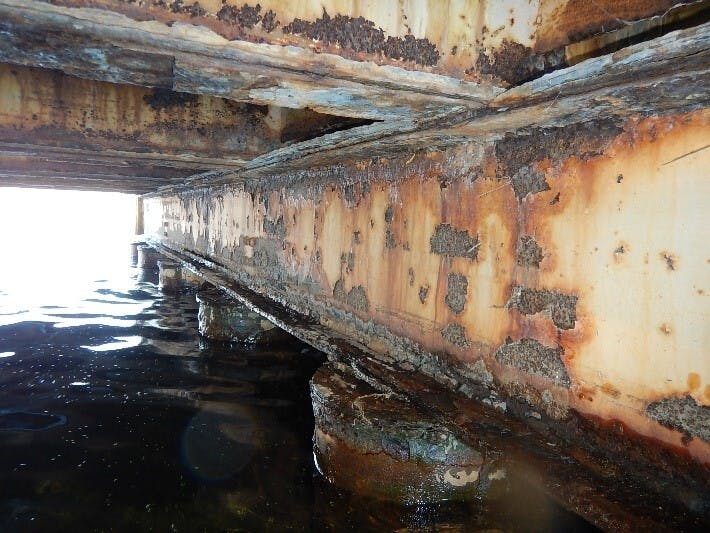 Photo 3: Typical pier beam deterioration 