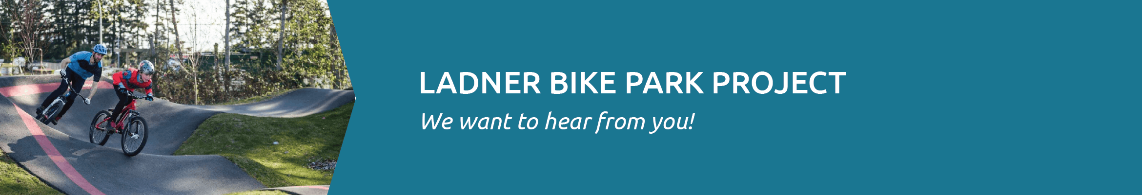Two riders navigate a new, paved pump track. 