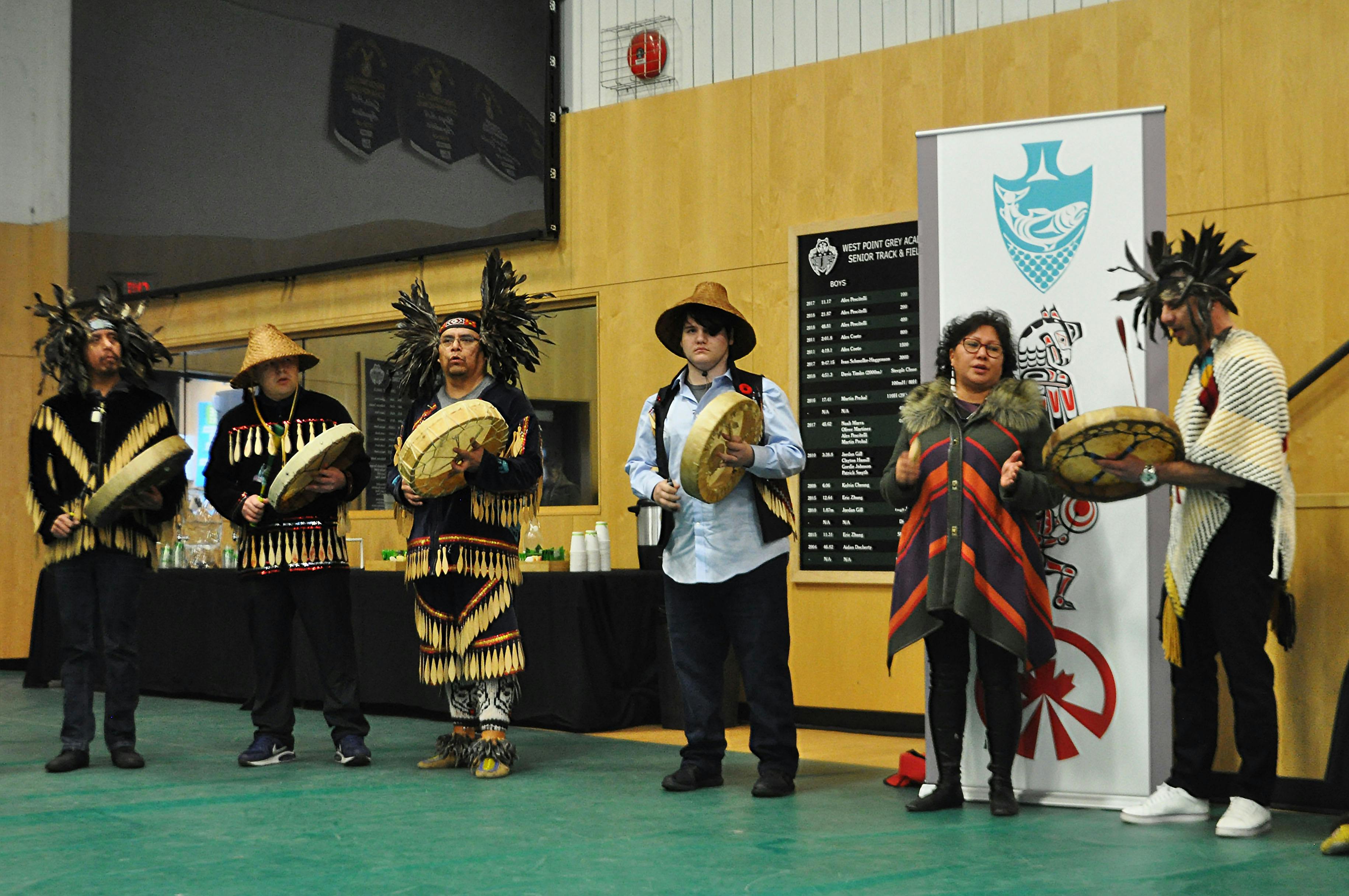 Host nation community members performing ceremony  launch event 