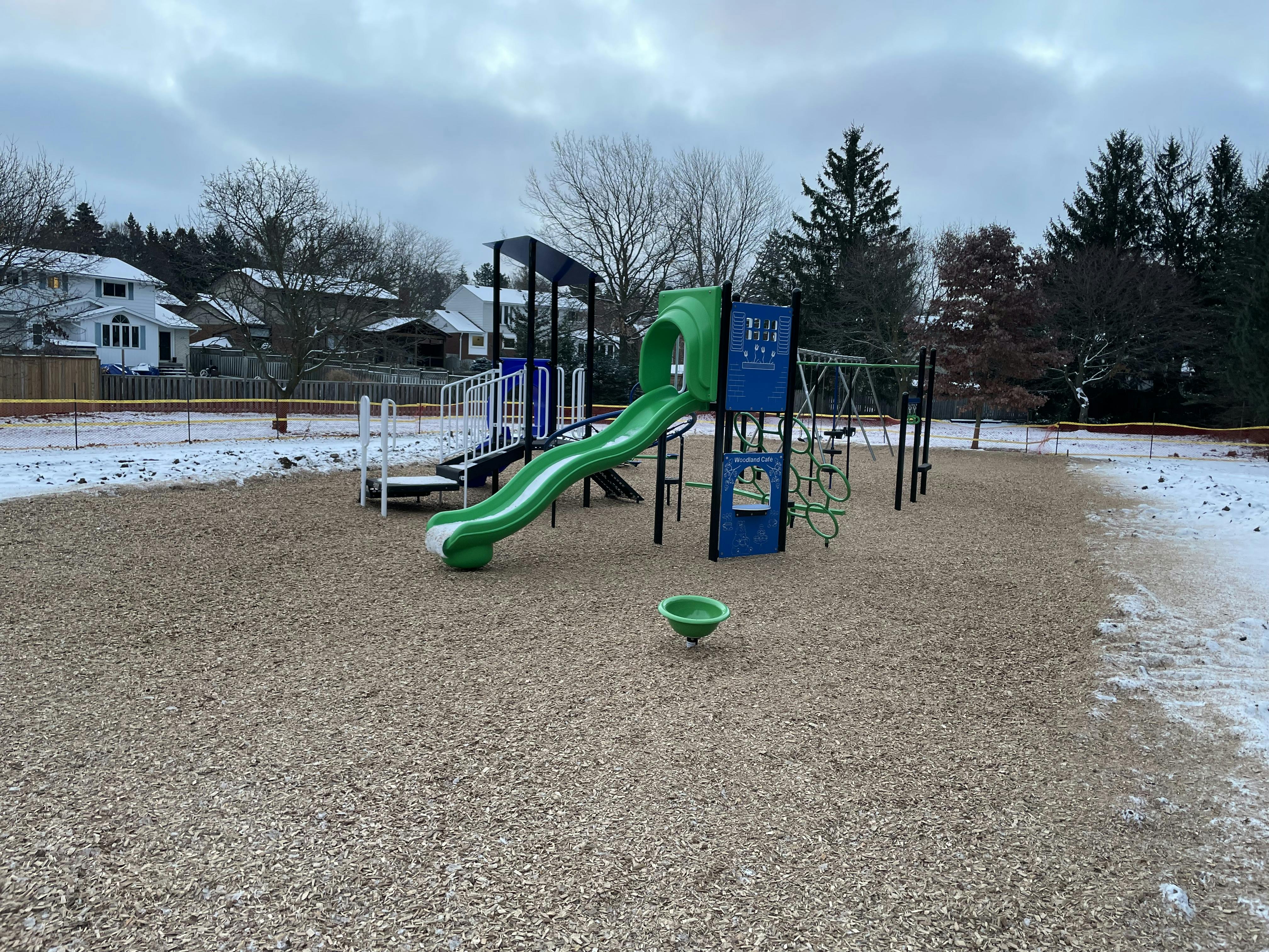 Thorndale playground with various new play structures including slides, climbing structures, swings and monkey bars.