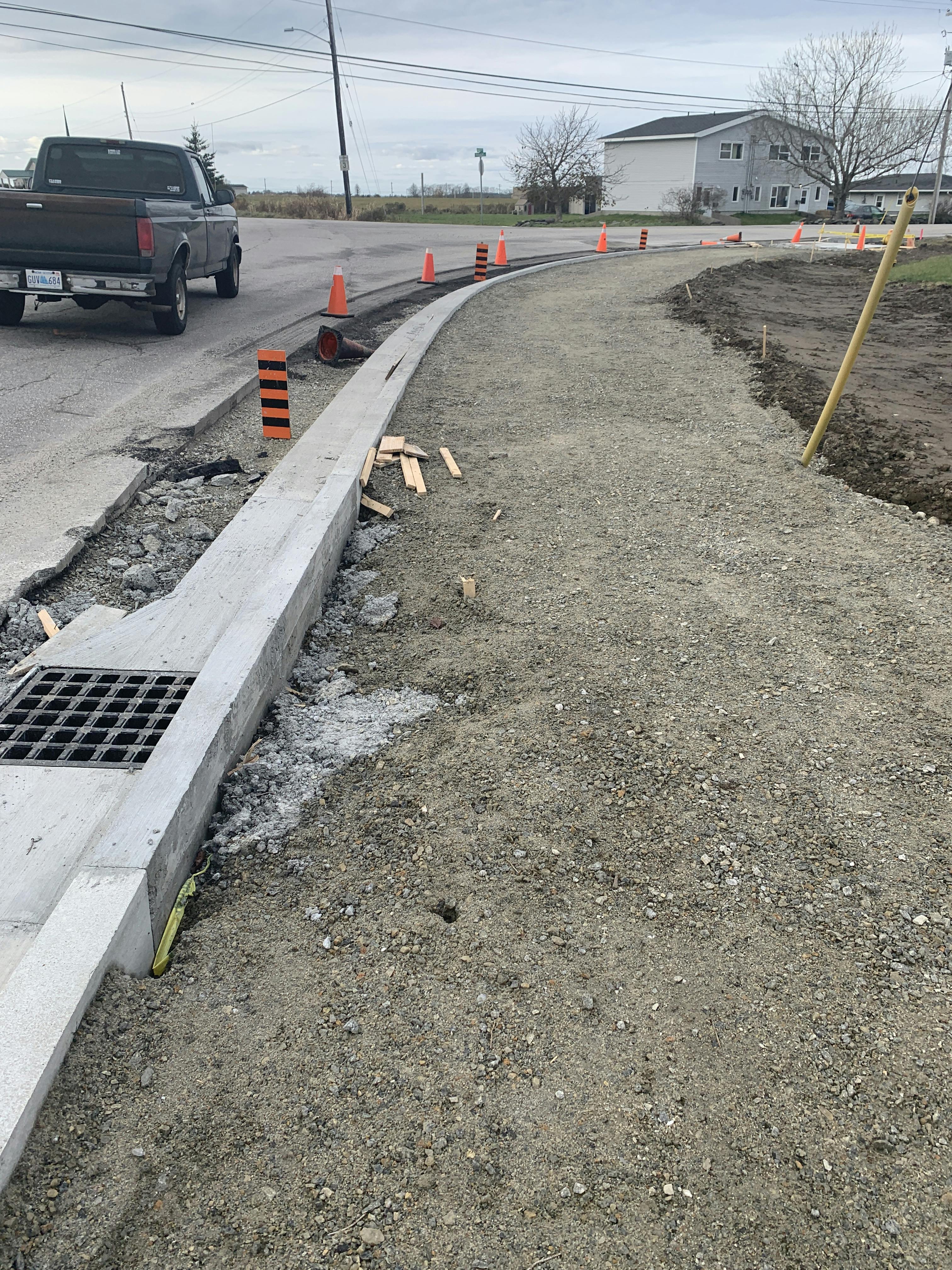 Installation of curbing at the corner of Haley Road and Parade Street.