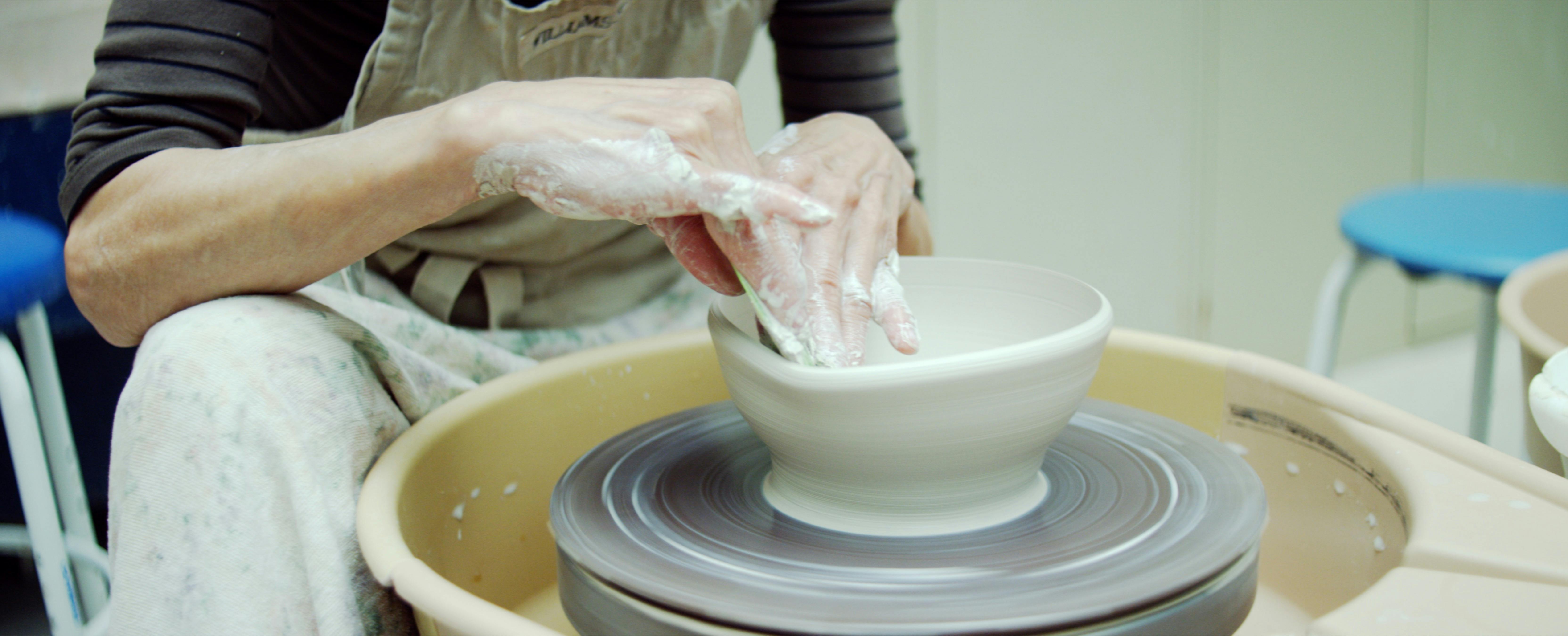 Someone on the pottery wheel