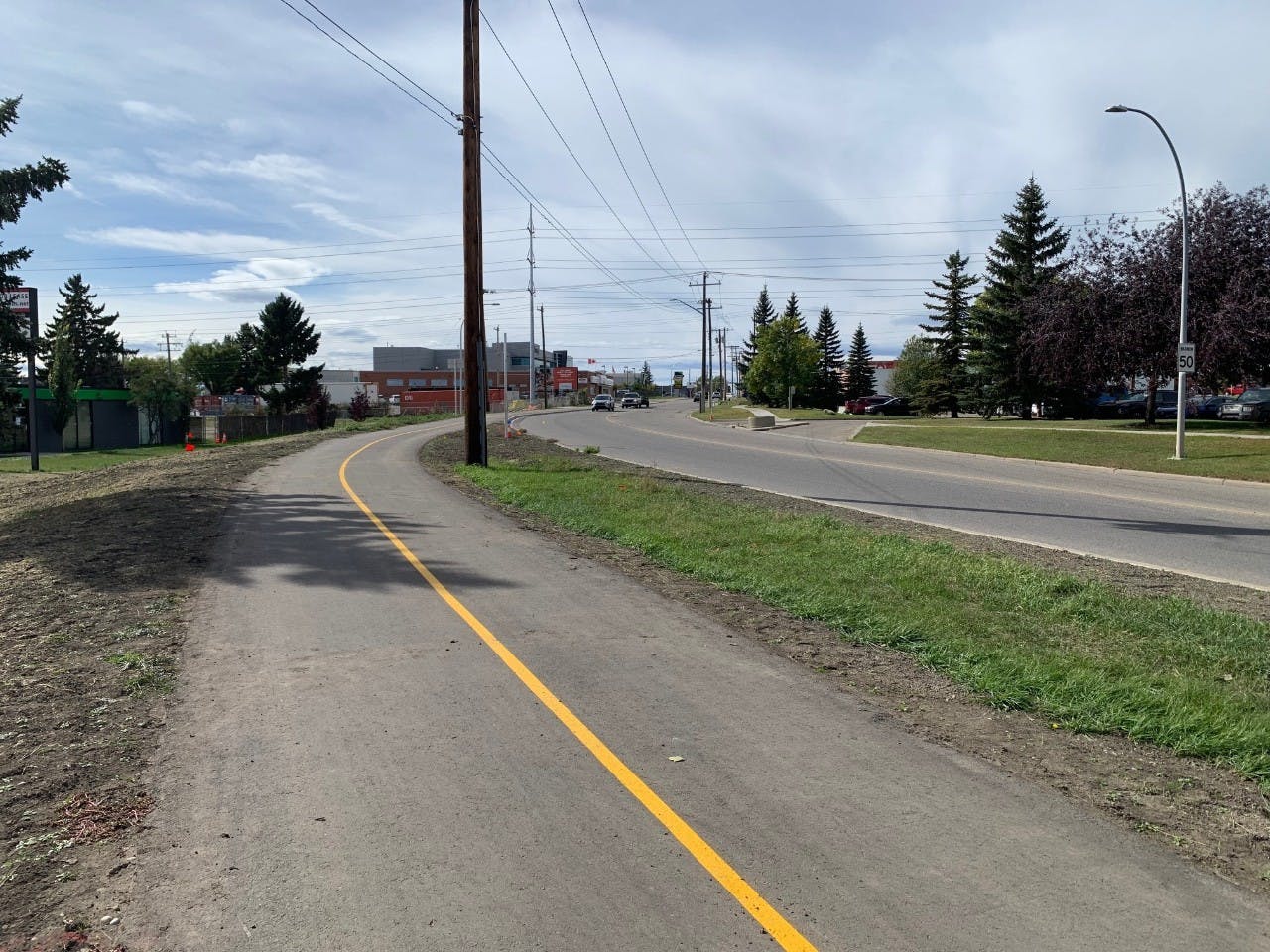 Multi-use Path Calgary 42 Ave (source: https://www.calgary.ca/transportation/ti/road-projects/42-avenue-se-complete-streets-project.html).jpeg