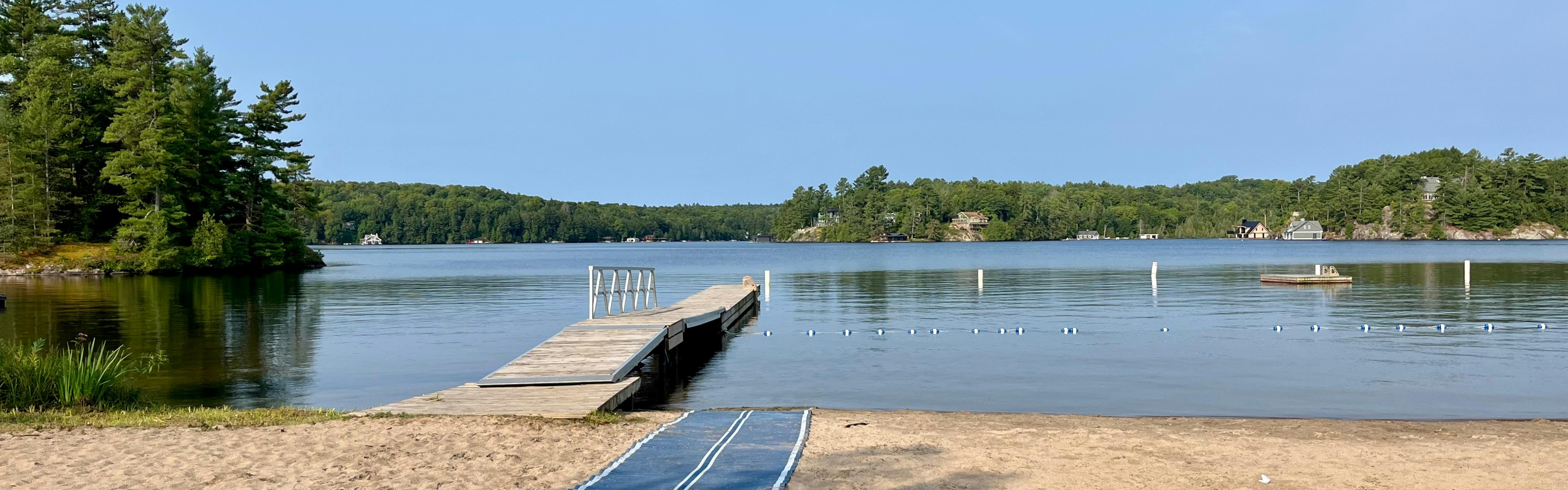 Image of Rosseau Waterfront Park with mobility mat leading to the beach