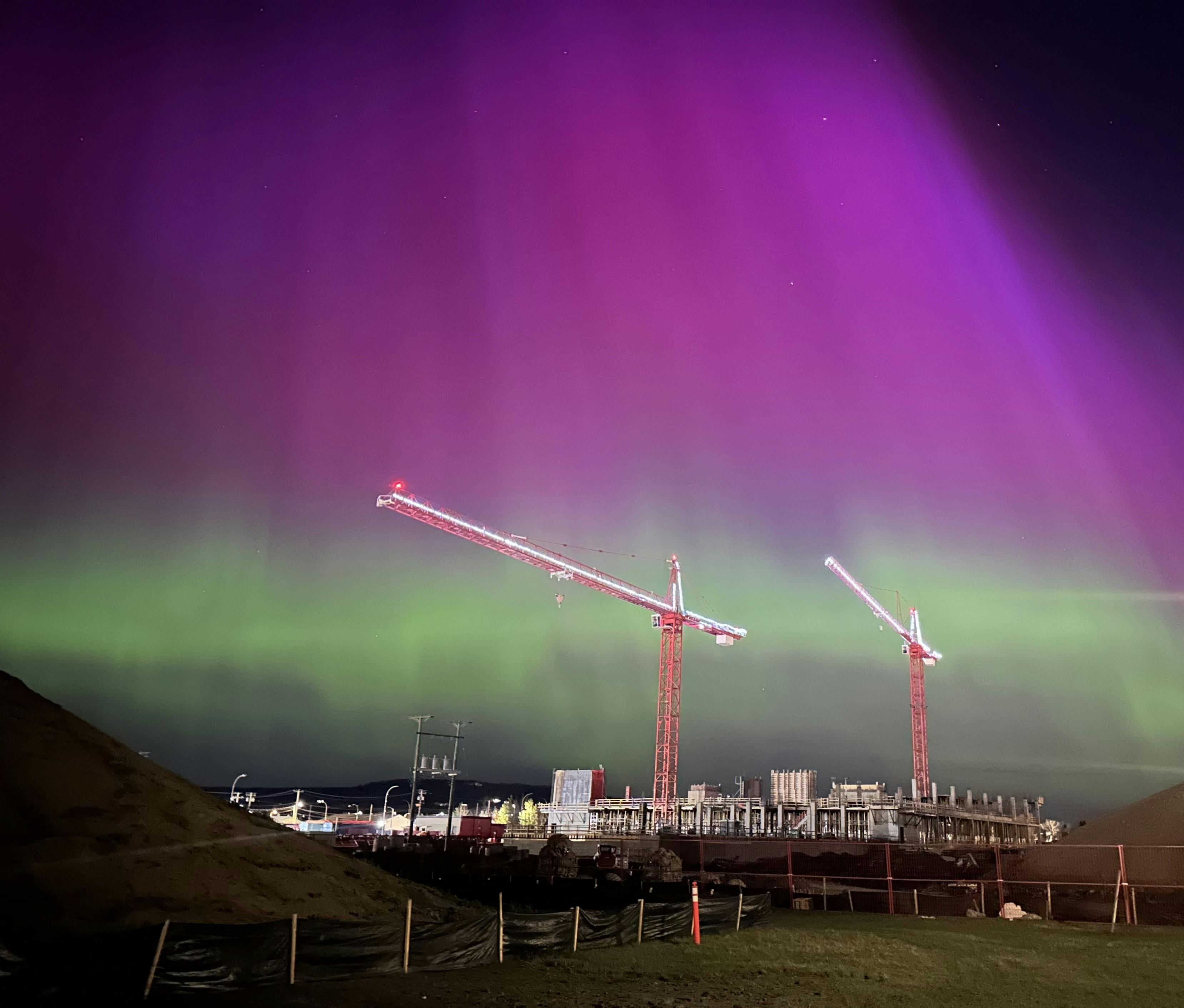Tower cranes compliment the Northern Lights
