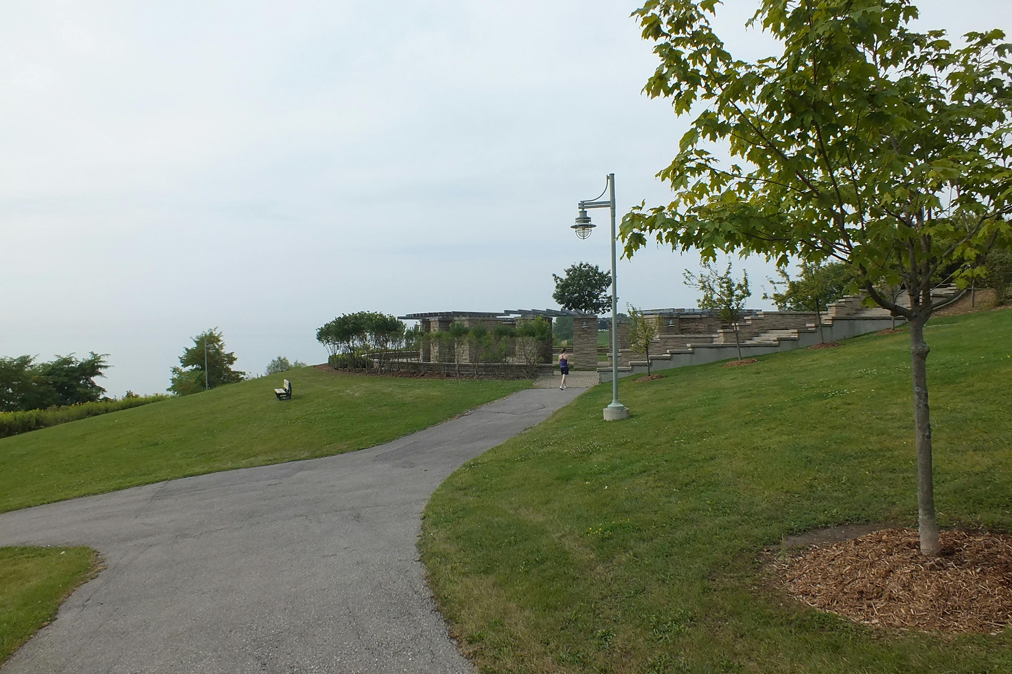 A gazebo structure and walking path outside of the Ajax Water Supply Plant.