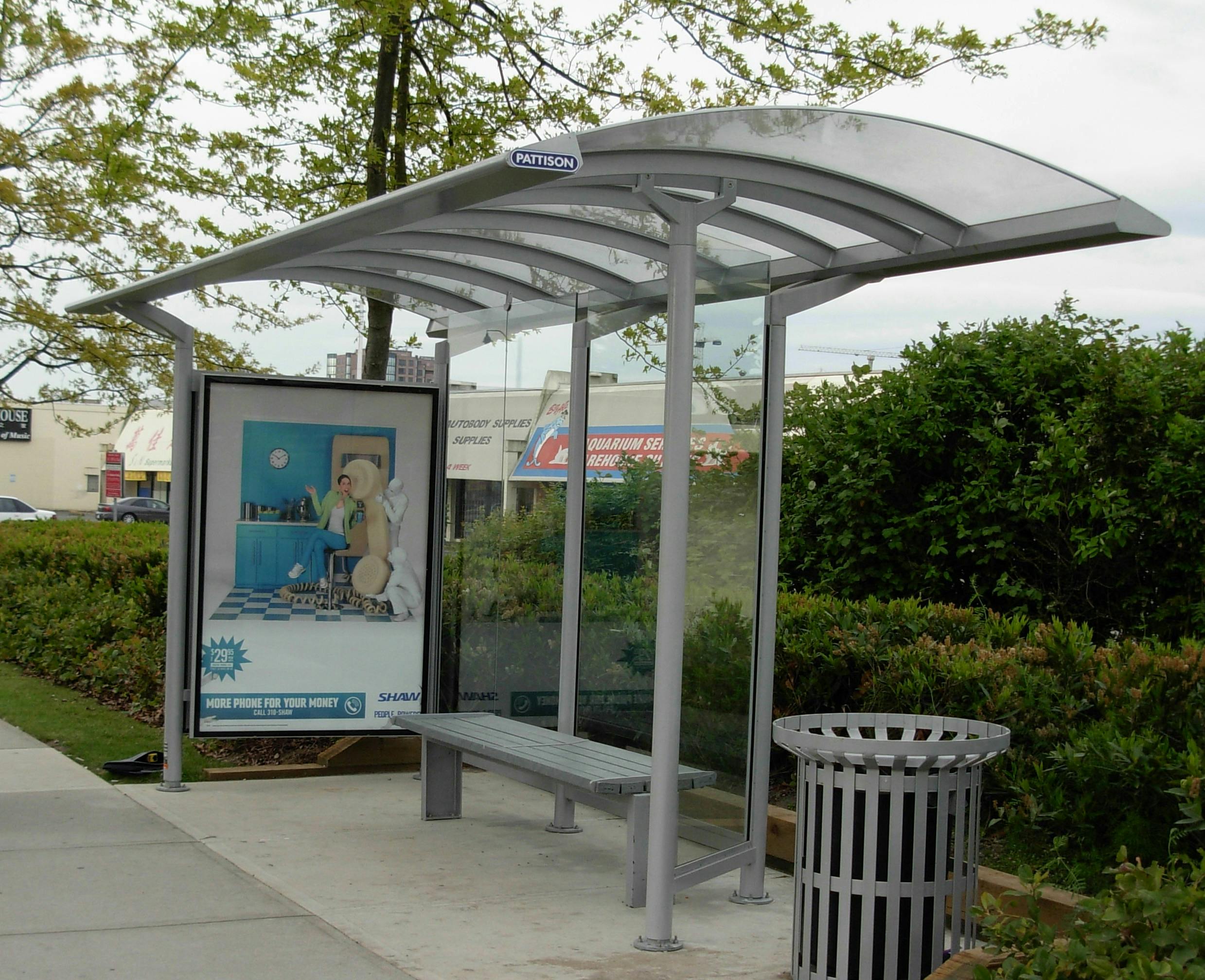Privately-owned updated transit shelter with advertising