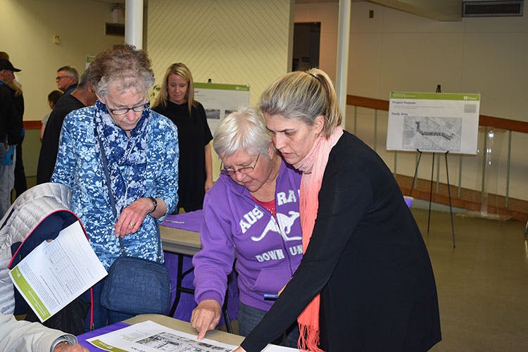 Residents chatting with City Staff