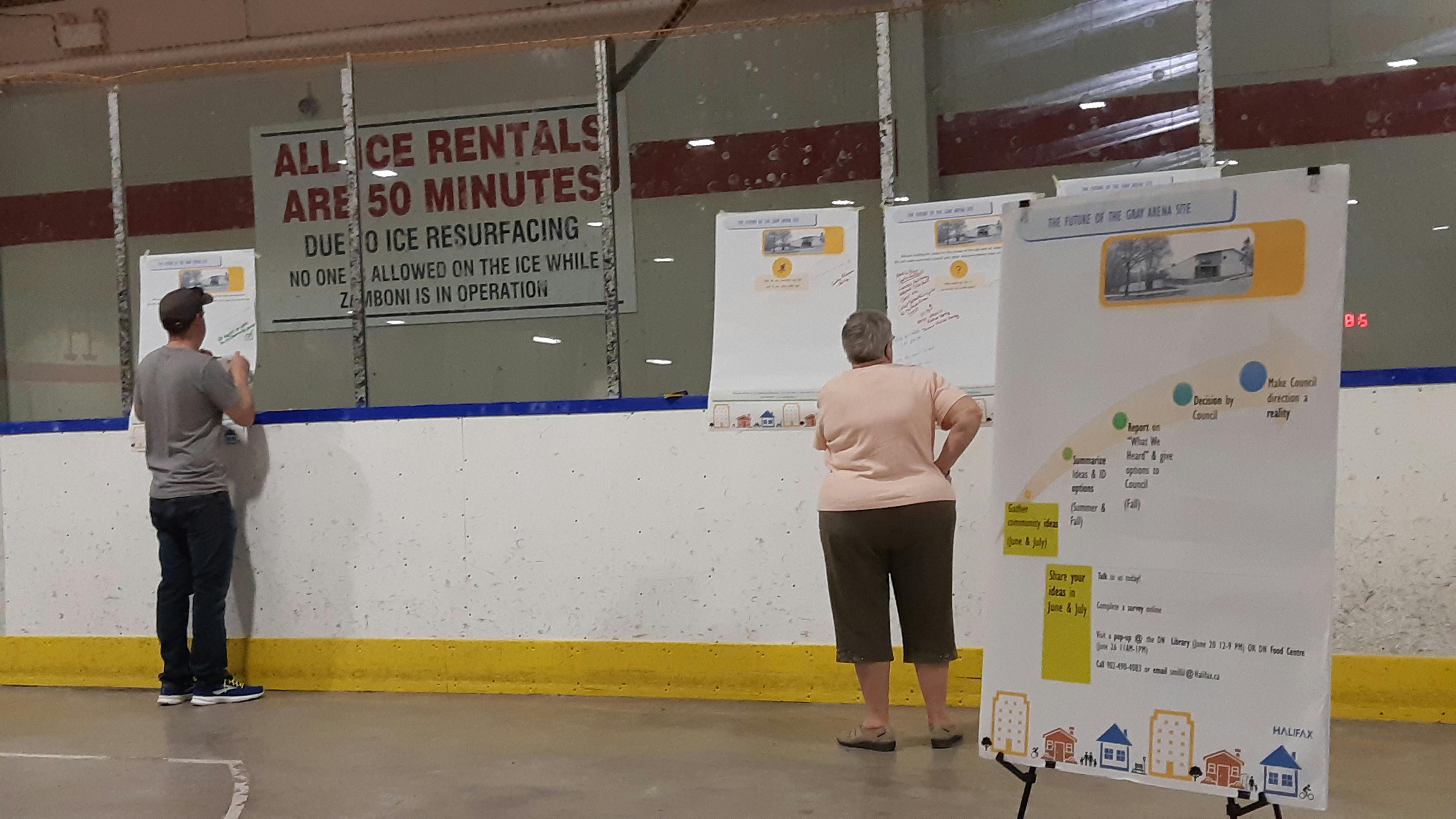 Checking out the information board...