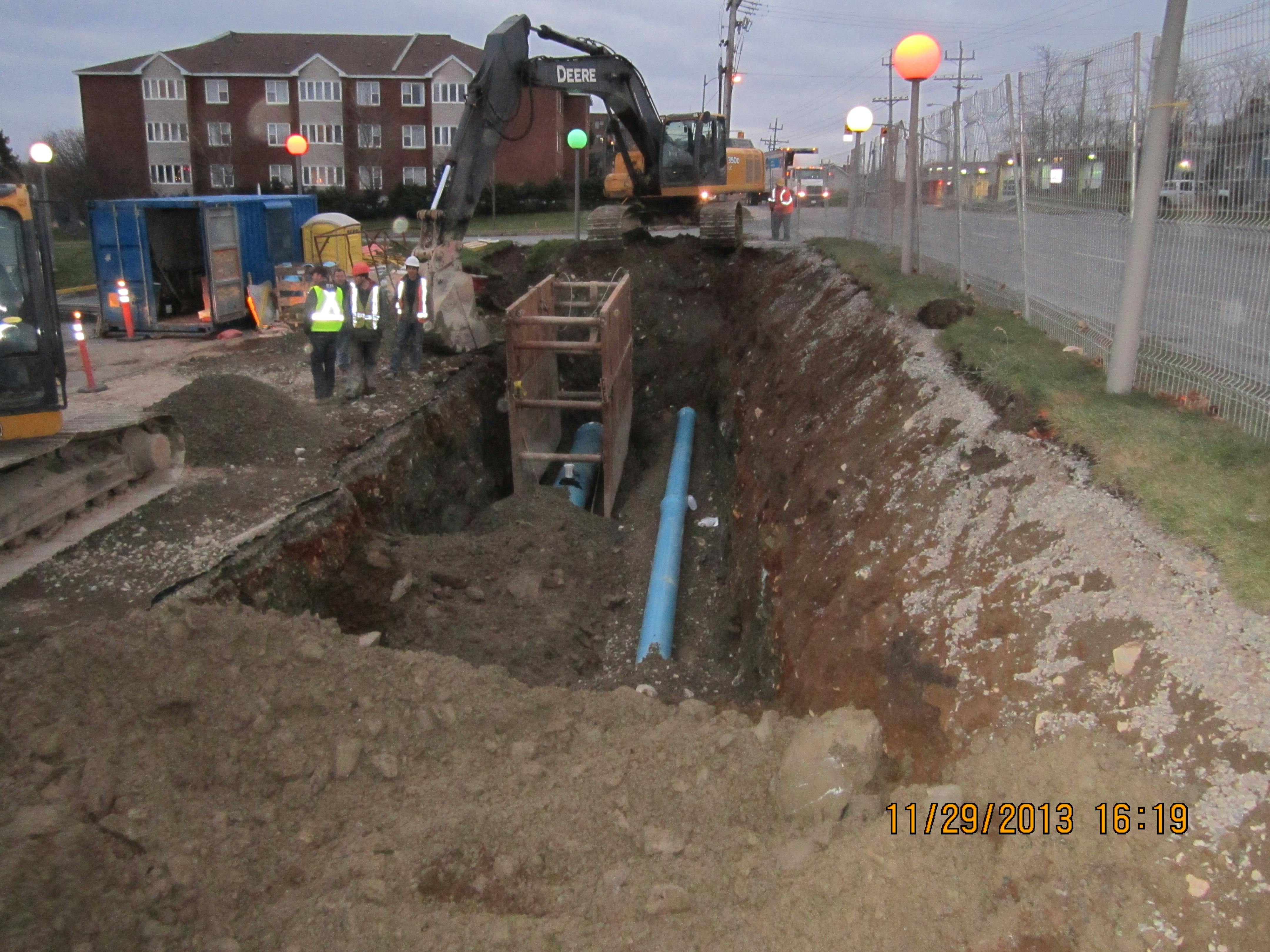 The photo shows a typical twin water main installation