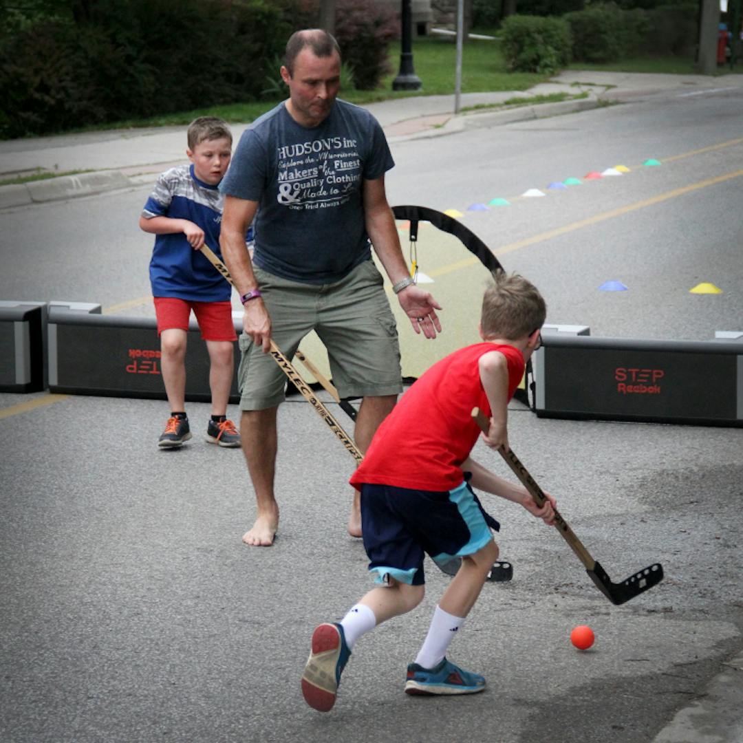 Open Streets closure on Main Street in Downtown Georgetown provided residents a chance to play road hockey, hula hoops, yoga and more. 