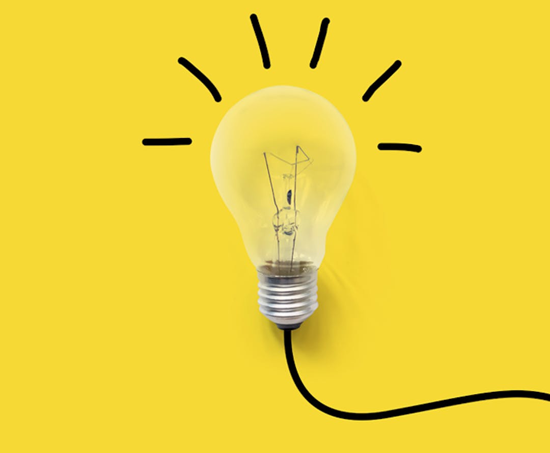 Light bulb A light bulb with a electrical cord leading off the edge, bright yellow background.