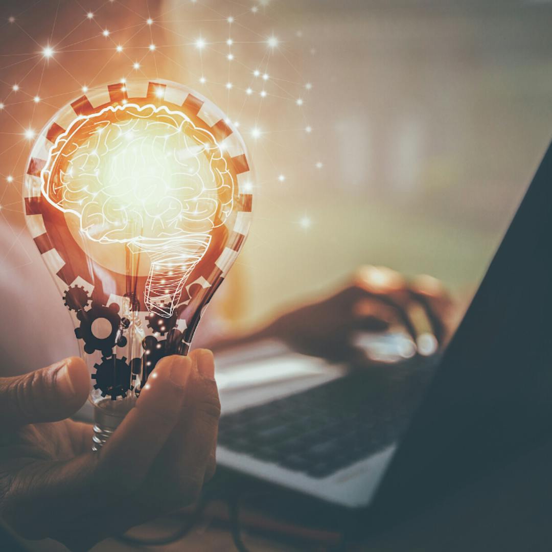 light bulb and laptop
