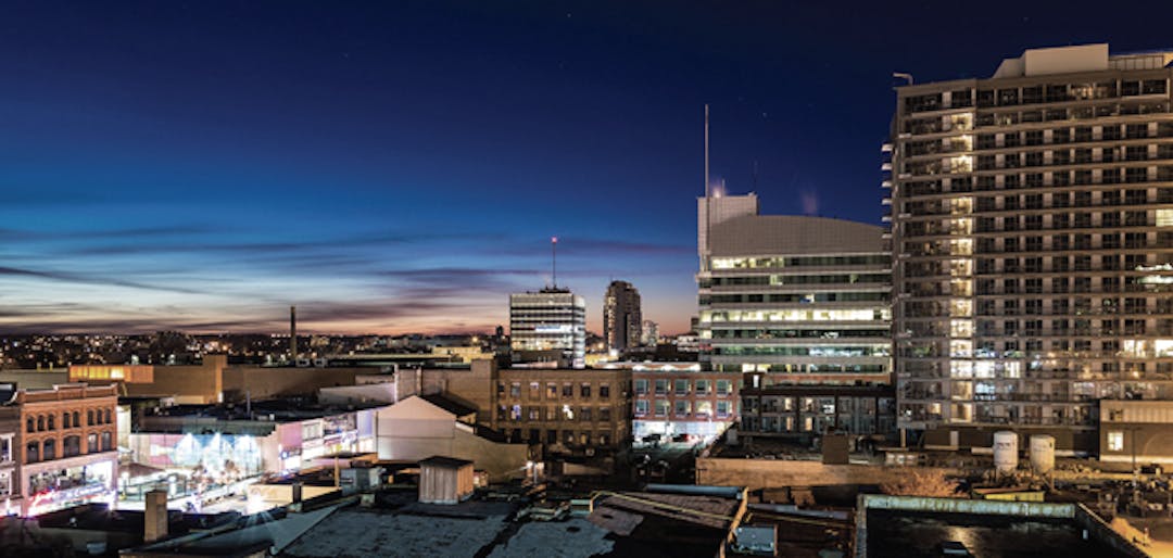 The downtown Kitchener skyline light up at night.