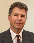 Membre de l’équipe, Dr. John Dornan